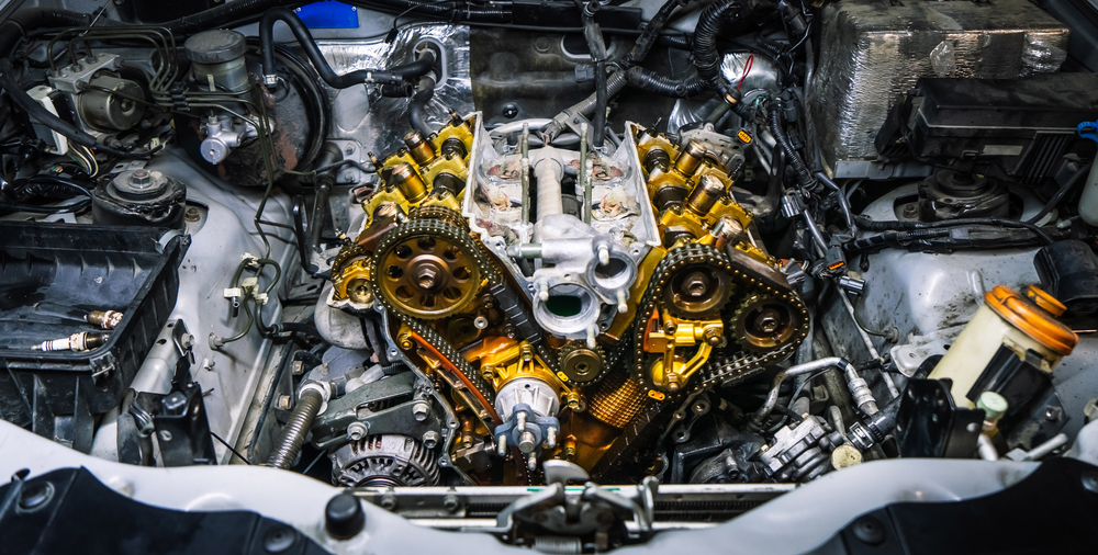 Car,repair:,type,of,open,engine,with,drive,chains,and